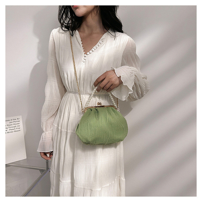 2024 NEW RETRO FAIRY SOLID COLOR PEQUENA SAQUETA BLANCA SAQUETA DE MANO PERLA LINHA DE MUJERES em saco simples de corpo cruzado