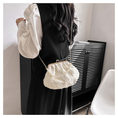 2024 NEW RETRO FAIRY SOLID COLOR PEQUENA SAQUETA BLANCA SAQUETA DE MANO PERLA LINHA DE MUJERES em saco simples de corpo cruzado