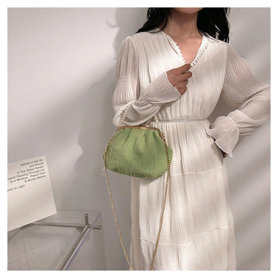 2024 NEW RETRO FAIRY SOLID COLOR PEQUENA SAQUETA BLANCA SAQUETA DE MANO PERLA LINHA DE MUJERES em saco simples de corpo cruzado
