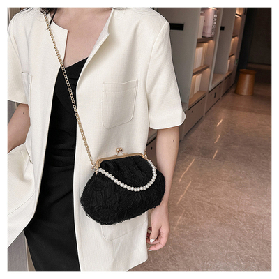 2024 NEW RETRO FAIRY SOLID COLOR PEQUENA SAQUETA BLANCA SAQUETA DE MANO PERLA LINHA DE MUJERES em saco simples de corpo cruzado
