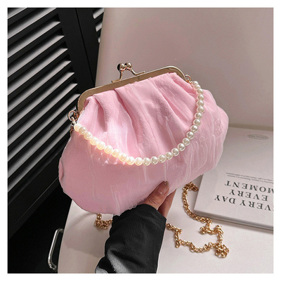2024 NEW RETRO FAIRY SOLID COLOR PEQUENA SAQUETA BLANCA SAQUETA DE MANO PERLA LINHA DE MUJERES em saco simples de corpo cruzado