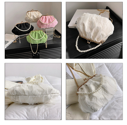 2024 NEW RETRO FAIRY SOLID COLOR PEQUENA SAQUETA BLANCA SAQUETA DE MANO PERLA LINHA DE MUJERES em saco simples de corpo cruzado