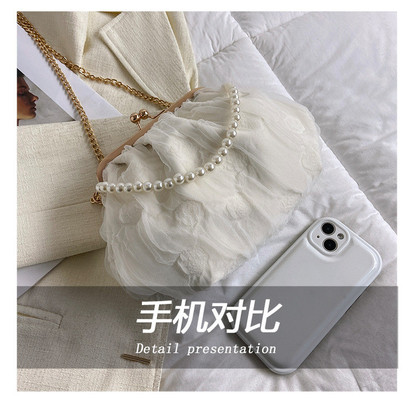 2024 NEW RETRO FAIRY SOLID COLOR PEQUENA SAQUETA BLANCA SAQUETA DE MANO PERLA LINHA DE MUJERES em saco simples de corpo cruzado