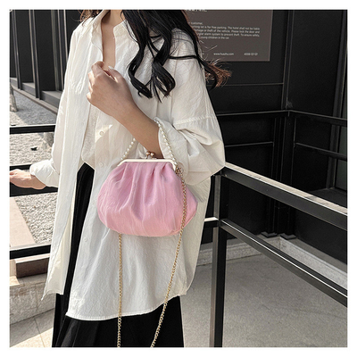 2024 NEW RETRO FAIRY SOLID COLOR PEQUENA SAQUETA BLANCA SAQUETA DE MANO PERLA LINHA DE MUJERES em saco simples de corpo cruzado