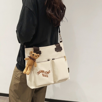 CANVAS TOTE BAG STREET FASHION GROSA Capacidade BALSA DE OLHO Classe masculina e feminina BALSA CROSSBODY BALSA DE VESTIMENTO BALSA DE VESTIMENTO
