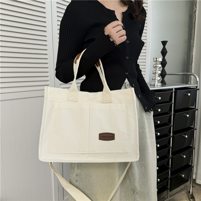 CANVAS TOTE BAG STREET FASHION GROSA Capacidade BALSA DE OLHO Classe masculina e feminina BALSA CROSSBODY BALSA DE VESTIMENTO BALSA DE VESTIMENTO