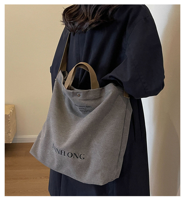 CANVAS TOTE BAG STREET FASHION GROSA Capacidade BALSA DE OLHO Classe masculina e feminina BALSA CROSSBODY BALSA DE VESTIMENTO BALSA DE VESTIMENTO