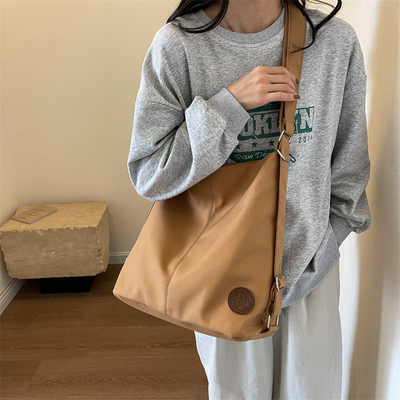 CANVAS TOTE BAG STREET FASHION GROSA Capacidade BALSA DE OLHO Classe masculina e feminina BALSA CROSSBODY BALSA DE VESTIMENTO BALSA DE VESTIMENTO