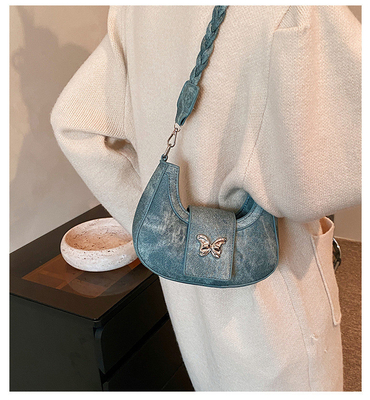 Popular nova bolsa de design de nicho moda feminina estilo estrangeiro bolso borboleta sentido avançado de todos os ombros bolsa de baixo braço
