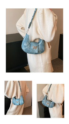 Popular nova bolsa de design de nicho moda feminina estilo estrangeiro bolso borboleta sentido avançado de todos os ombros bolsa de baixo braço