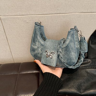 Popular nova bolsa de design de nicho moda feminina estilo estrangeiro bolso borboleta sentido avançado de todos os ombros bolsa de baixo braço