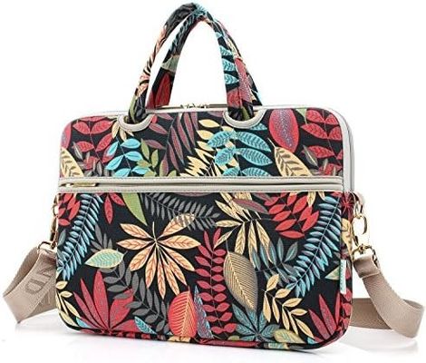 Saco portátil concebido para portáteis de 12,5 a 14 polegadas com tecido de lona impressa interior acolchado e várias opções de transporte